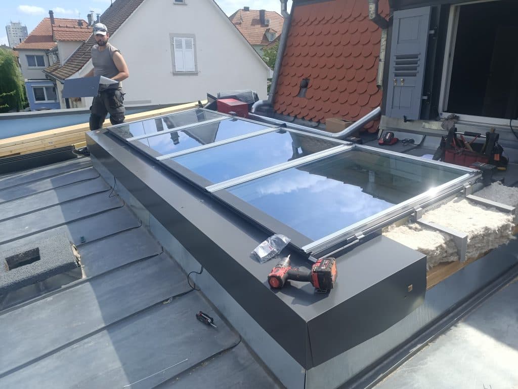 Création d’une verrière modulaire velux sur une extension en zinc